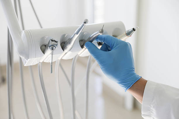 Professional Tooth Extraction technician working in Midland, TX